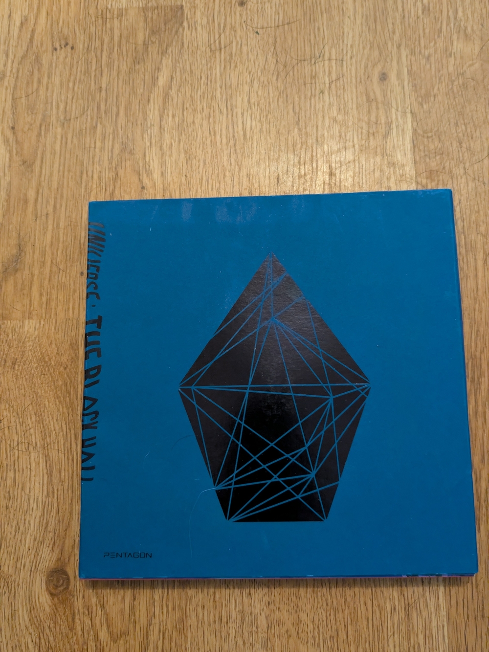 Pentagon Blue Geometric Album Cover